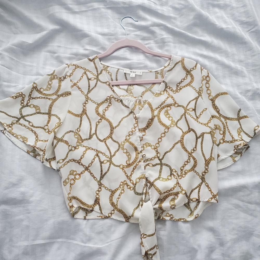 White & gold shirt